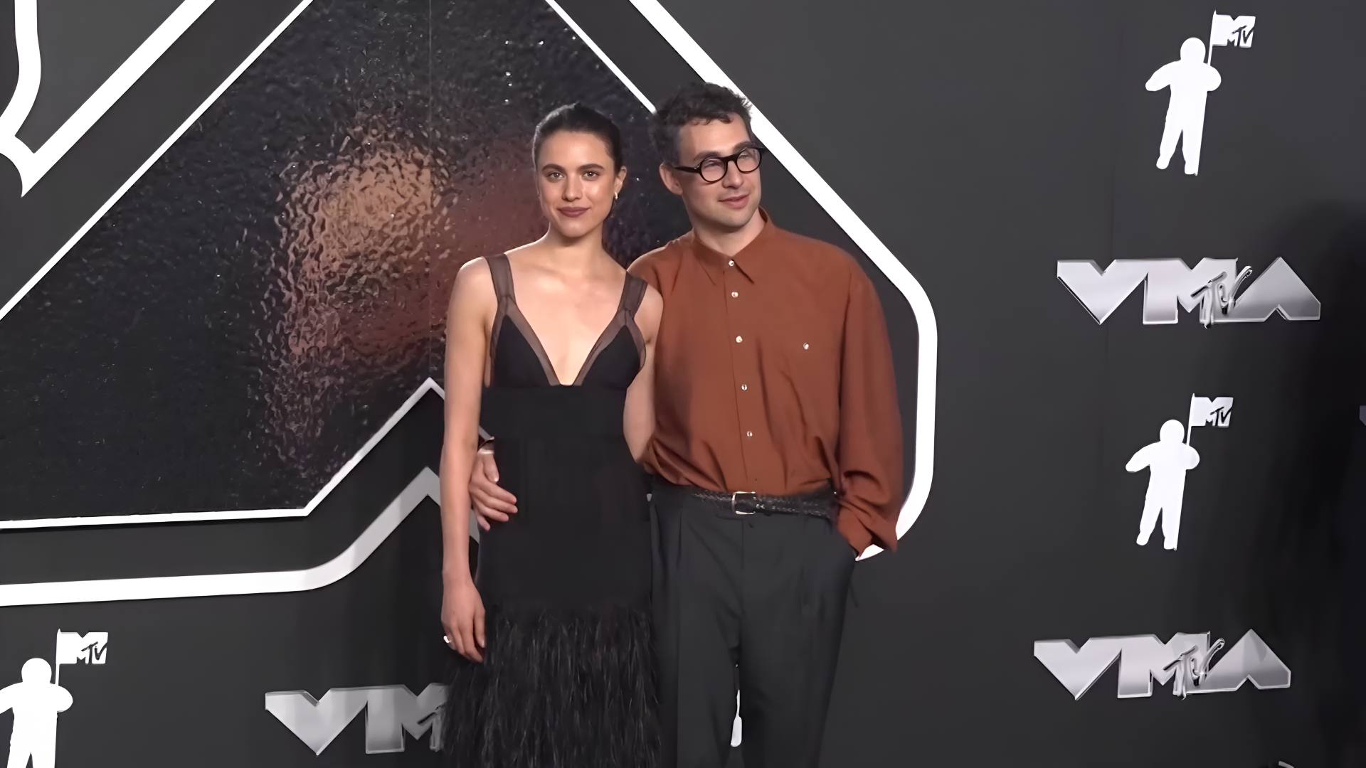 The dress kept things classic. The footwear changed the entire mood.